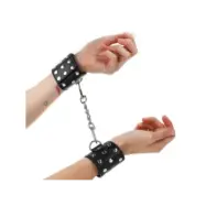 Kink Wrist Restraints With Snap Fasten Full Of Rivets Black Adjustable 19-24 Cm X 5.5 Cm